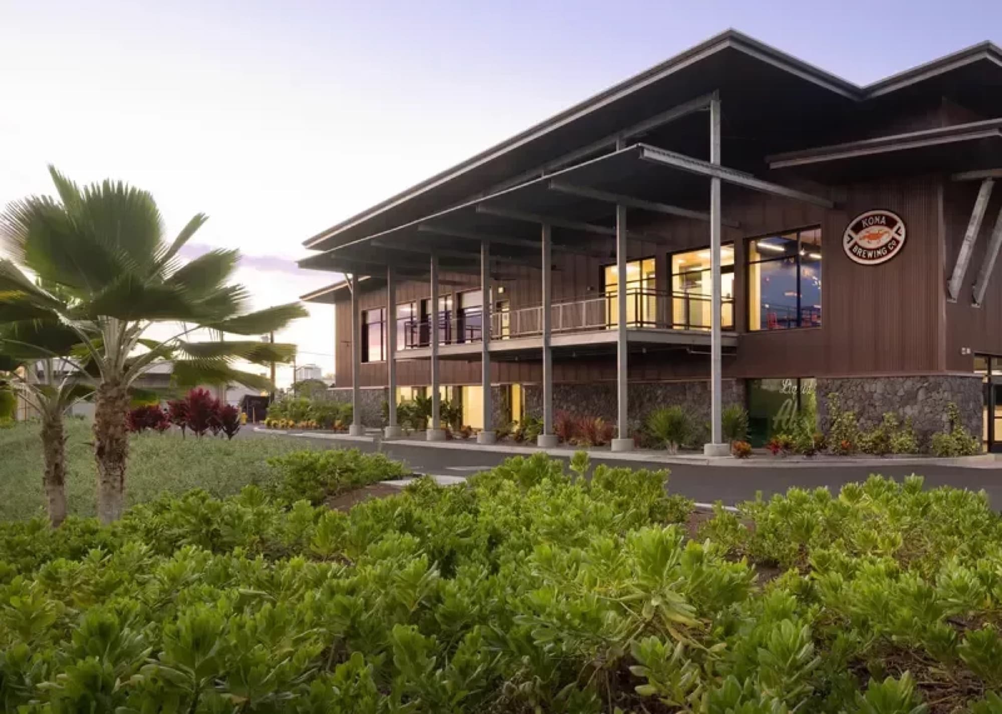 Kona Brewing Co. — two story building palm tree